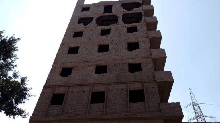 Local Development: Demolition of Violating Floors in a Building in Al ...